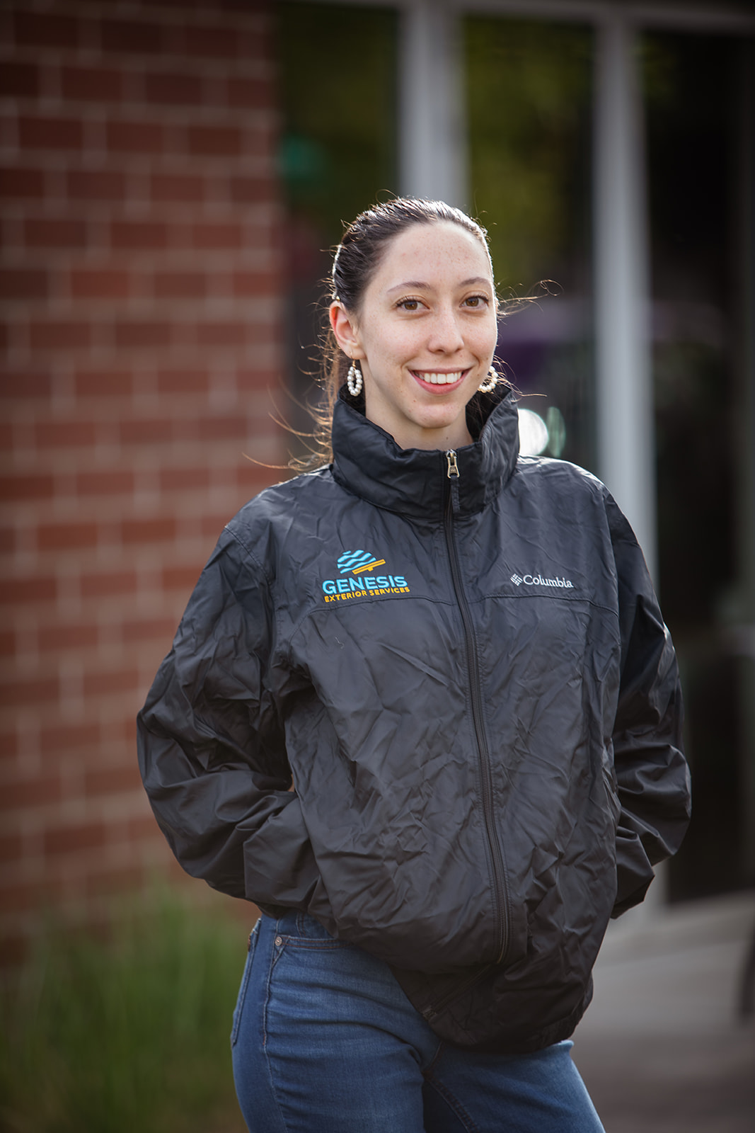Man wearing Columbia jacket with Strategic IT custom embroidered logo
